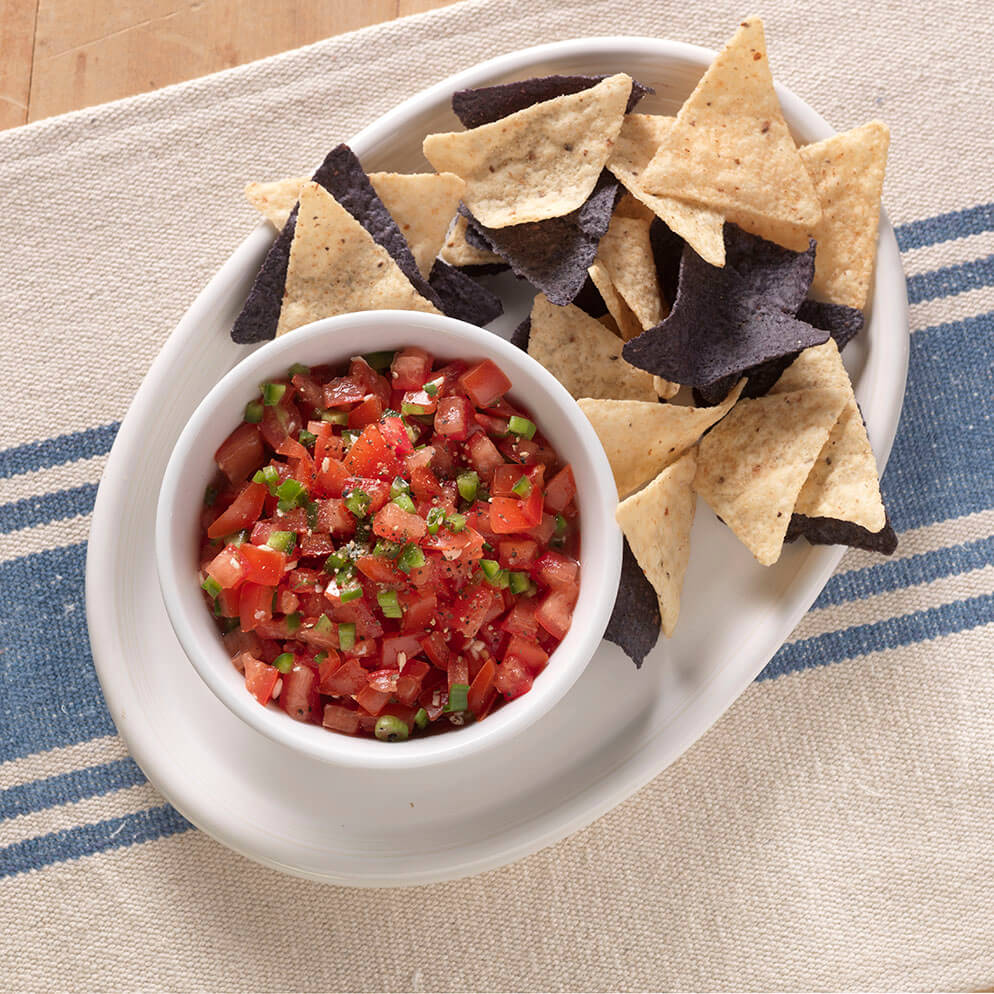  Fresh Tomato Salsa in bowl with tortilla chips recipe made with ReaLemon 