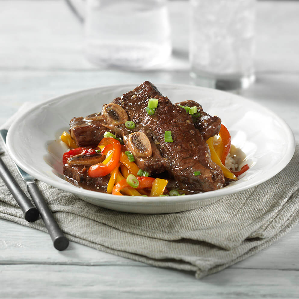 Lemon Teriyaki Beef Short Ribs with Rainbow Peppers in bowl recipe made with ReaLemon