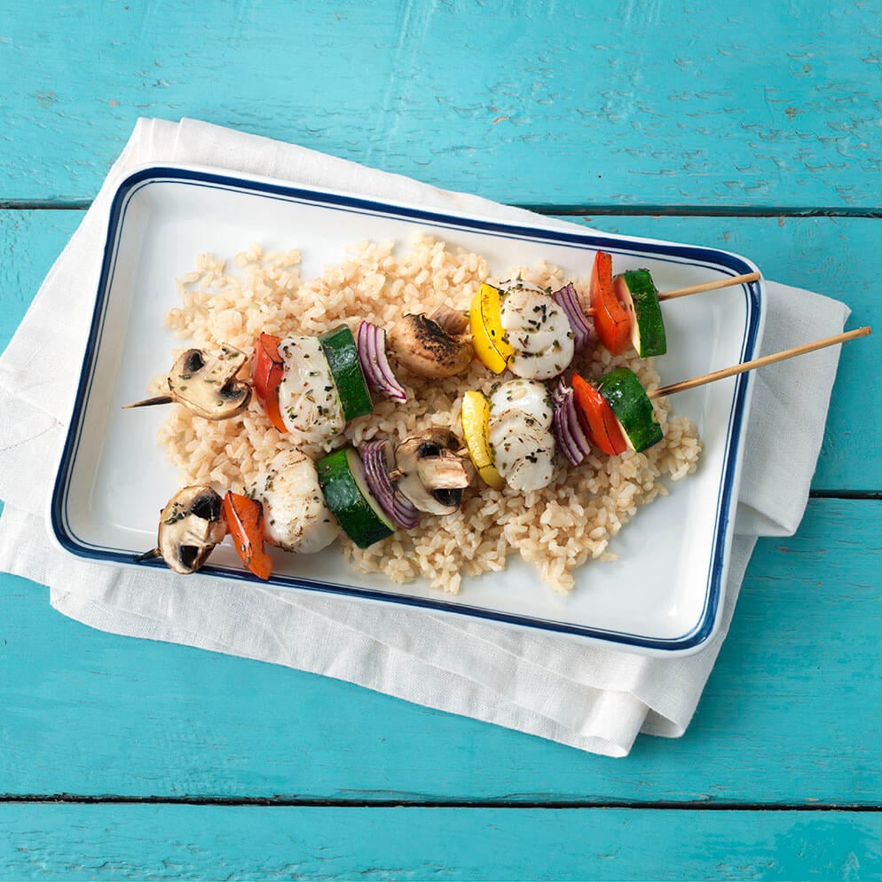  Scallop Kebabs on platter with veggies and rice recipe made with ReaLemon 